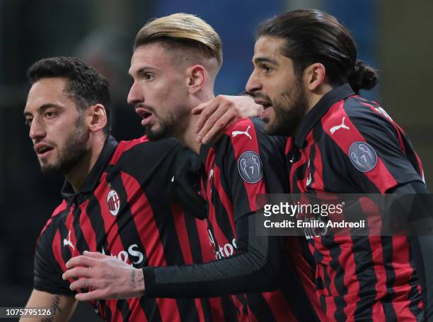 Samuel Castillejo of AC Milan celebrates his goal with his team-mates Ricardo Rodriguez and Hakan Calhanoglu during the Serie A match between AC...