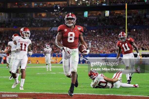 Josh Jacobs of the Alabama Crimson Tide scores a touchdown in the second quarter during the College Football Playoff Semifinal against the Oklahoma...