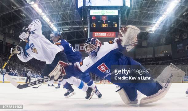 Samuel Hlavaj of Slovakia dives across the crease versus Finland at the IIHF World Junior Championships at the Save-on-Foods Memorial Centre on...