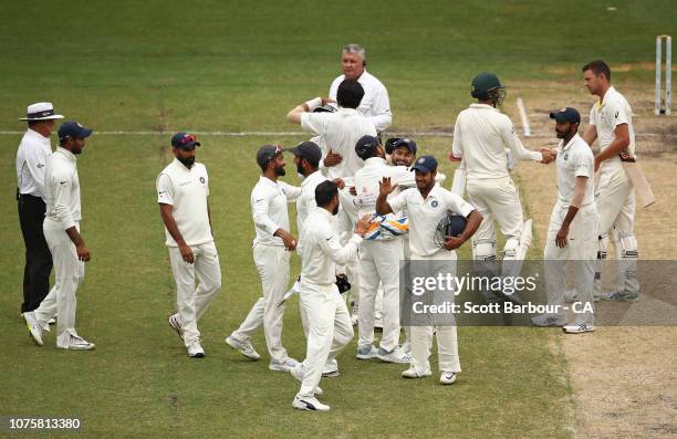 India celebrate after winning the match during day five of the Third Test match in the series between Australia and India at Melbourne Cricket Ground...