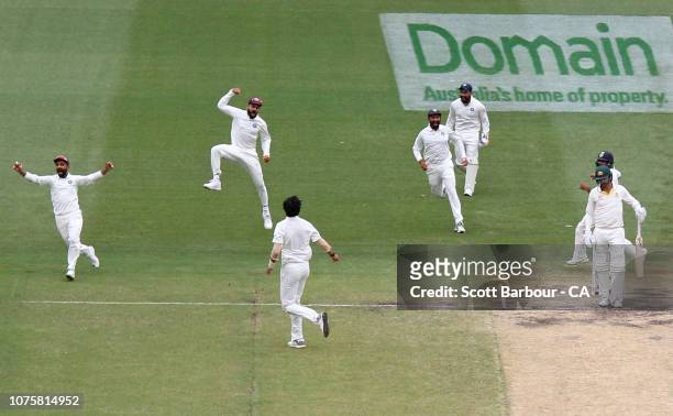Virat Kohli of India celebrates after Ishant Sharma of India dismisses Nathan Lyon of Australia to win the match during day five of the Third Test...