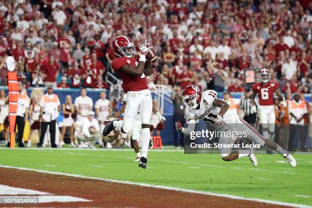 Jerry Jeudy of the Alabama Crimson Tide completes the catch for a touchdown in the fourth quarter during the College Football Playoff Semifinal...