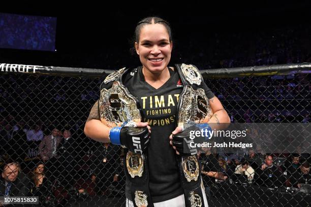 Amanda Nunes of Brazil celebrates her KO victory over Cris Cyborg of Brazil in their women's featherweight bout during the UFC 232 event inside The...