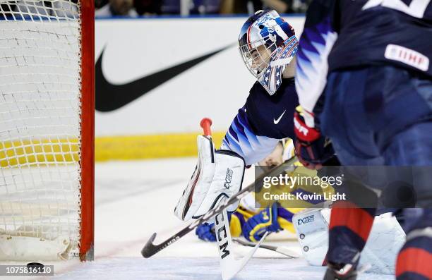 Kyle Keyser of the United States watches as the puck goes into the net during the second period versus Sweden at the IIHF World Junior Championships...