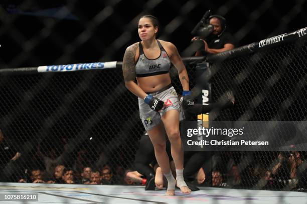 Amanda Nunes of Brazil reacts after knocking out Cris Cyborg of Brazil in their women's featherweight bout during the UFC 232 event inside The Forum...