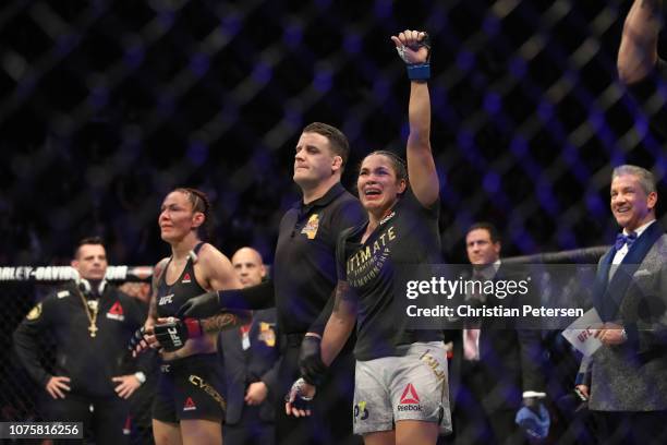 Amanda Nunes of Brazil celebrates after defeating Cris Cyborg of Brazil in their women's featherweight bout during the UFC 232 event inside The Forum...