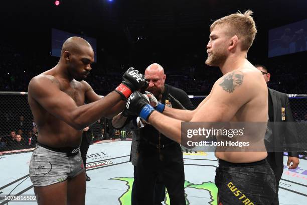 Jon Jones and Alexander Gustafsson of Sweden touch gloves prior to their light heavyweight bout during the UFC 232 event inside The Forum on December...