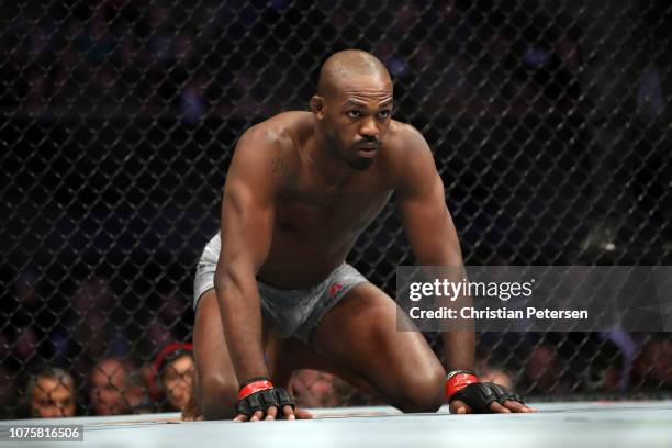 Jon Jones kneels in his corner prior to facing Alexander Gustafsson of Sweden in their light heavyweight bout during the UFC 232 event inside The...