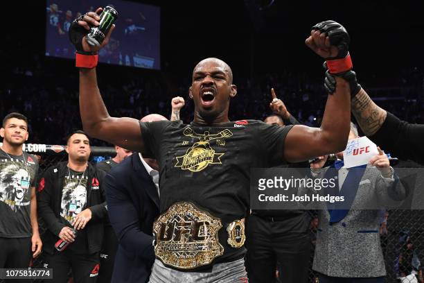 Jon Jones celebrates his KO victory over Alexander Gustafsson of Sweden in their light heavyweight bout during the UFC 232 event inside The Forum on...