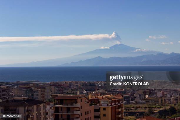 View of the Etna volcano, from Reggio Calabria, during the eruption that caused a fracture on the South East side. The eruption also caused a seismic...