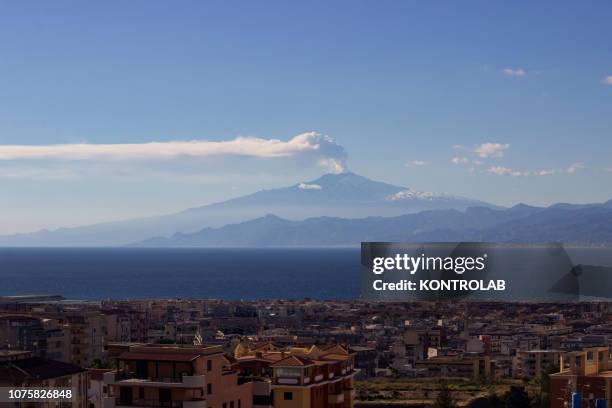 View of the Etna volcano, from Reggio Calabria, during the eruption that caused a fracture on the South East side. The eruption also caused a seismic...