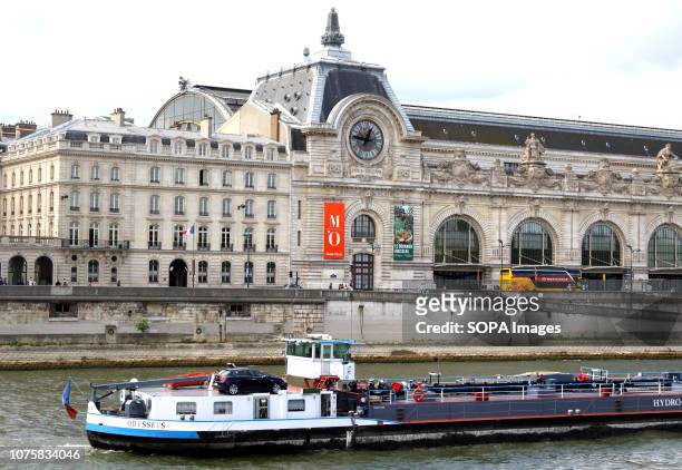 Musee D'Orsay building seen on the banks of River Seine in Paris.
