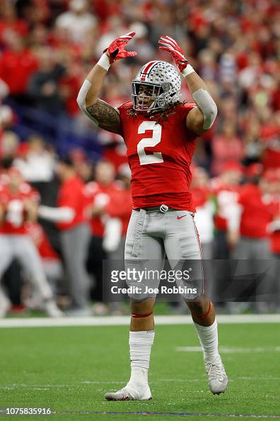 J.K. Dobbins of the Ohio State Buckeyes celebrates after a play... News ...