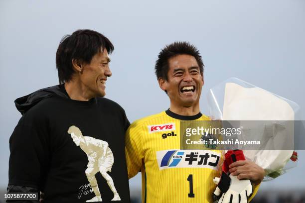Yoshikatsu Kawaguchi of SC Sagamihara and Seigo Narazaki of Nagoya Grampus spekas during his retirement ceremony following the J.League J3 match...