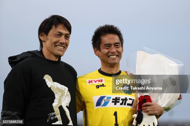 Yoshikatsu Kawaguchi of SC Sagamihara and Seigo Narazaki of Nagoya Grampus pose for photographs during his retirement ceremony following the J.League...