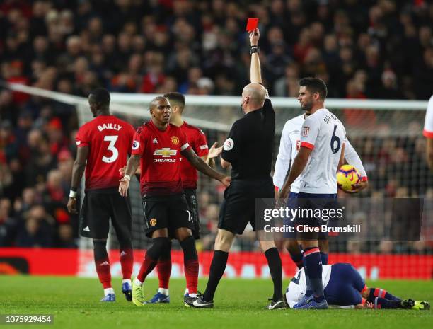 Ashley Young of Manchester United appeals as Eric Bailly of Manchester United is shown a red card and is sent off by referee Lee Mason during the...