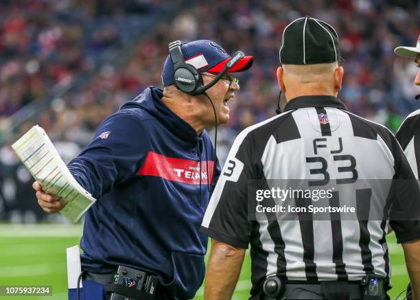 Houston Texans head coach Bill O'Brien challenges referee Pete Morelli after Houston Texans wide receiver DeAndre Carter took a hit by Jacksonville...