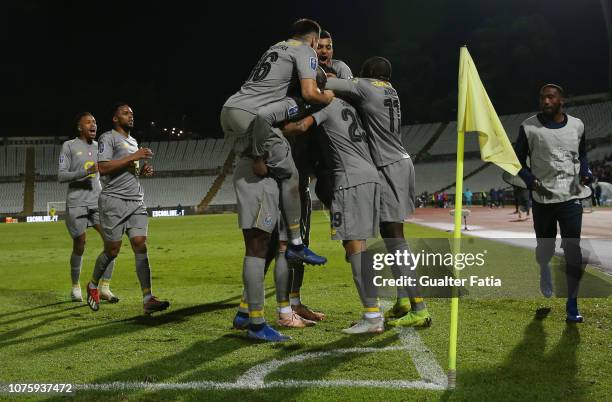Tiquinho Soares of FC Porto celebrates with teammates after scoring a goal during the Portuguese League Cup match between Belenenses SAD and FC Porto...