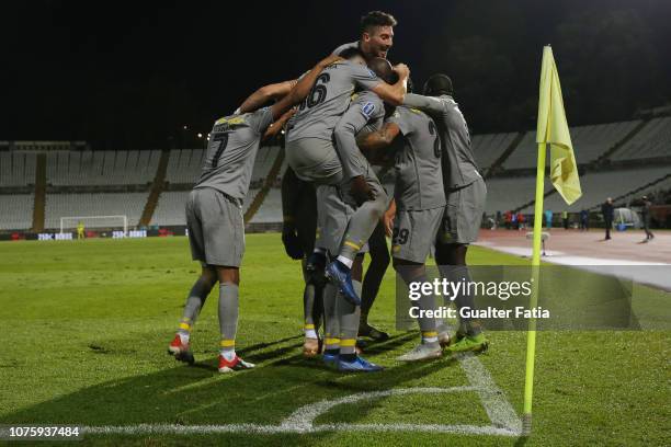 Tiquinho Soares of FC Porto celebrates with teammates after scoring a goal during the Portuguese League Cup match between Belenenses SAD and FC Porto...