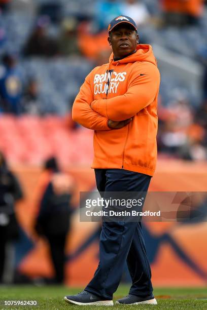 Head coach Vance Joseph of the Denver Broncos walks on the field before a game against the Los Angeles Chargers at Broncos Stadium at Mile High on...