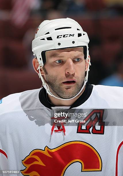 Robyn Regehr of the Calgary Flames looks on against the Anaheim Ducks at the Honda Center on December 10, 2010 in Anaheim, California.