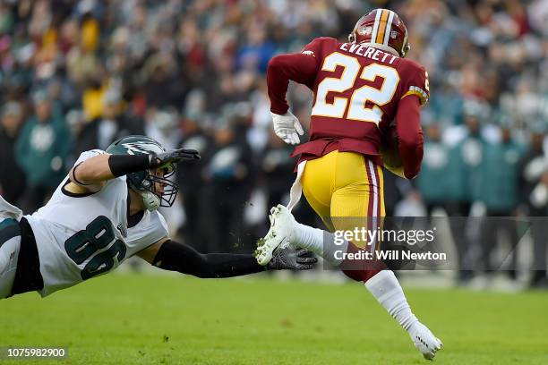 Zach Ertz of the Philadelphia Eagles dives after Deshazor Everett of the Washington Redskins after an interception by Deshazor Everett during the...