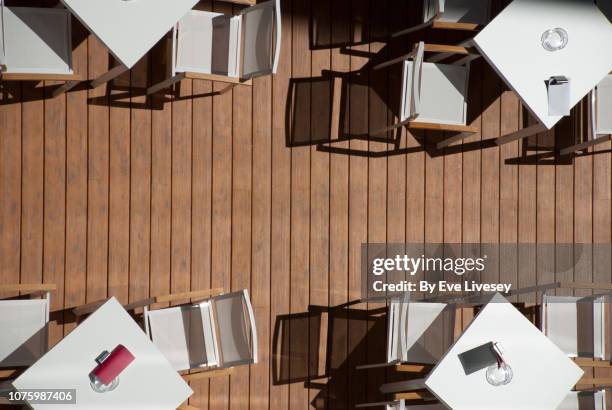 sidewalk cafe - wood deck top view stock pictures, royalty-free photos & images