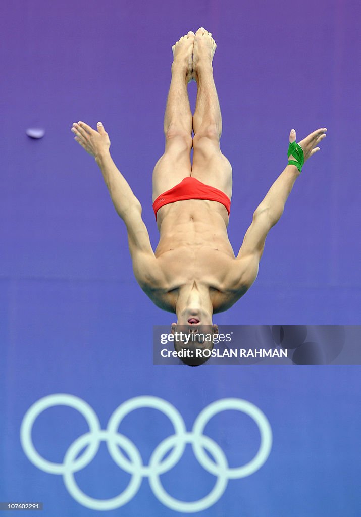 Pyritz Pools Tim Pyritz of Germany dives in the youth men's 3m springboard... News ...