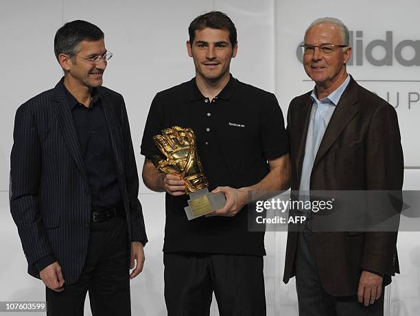 Of the German sportswear and equipment group Adidas Herbert Hainer, Golden Glove winner Spain's goalkeeper Iker Casillas and German football legend...