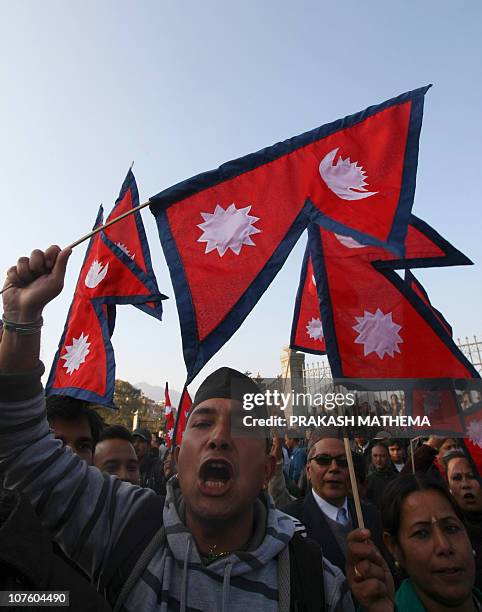 Nepalese former crown prince Paras Shah's supporters shout slogan against the arrest of Paras Shah in Kathmandu on December 15, 2010. The former...