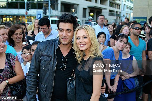 James Stewart and Jessica Marais arrive for an exclusive Bon Jovi concert at Star City on December 15, 2010 in Sydney, Australia.