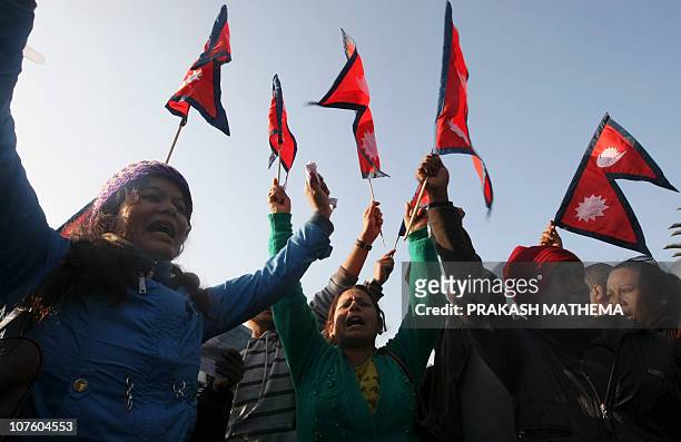 Nepalese former crown prince Paras Shah's supporters shout slogan against the arrest of Paras Shah in Kathmandu on December 15, 2010. The former...