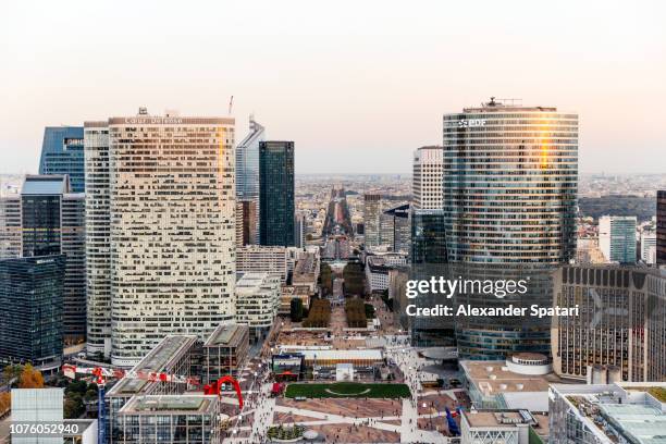 aerial view of la defense financial district during sunset in paris, france - eurozone stock pictures, royalty-free photos & images