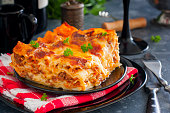 Traditional Italian Lasagna Bolognese with minced meat and tomato sauce, horizontal