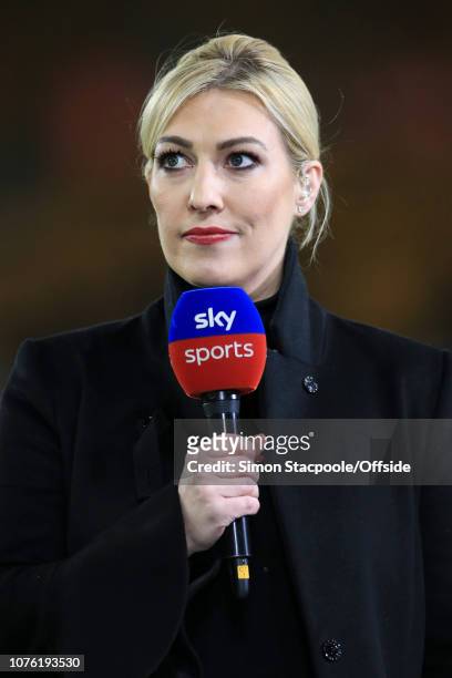 Sky Sports television presenter Kelly Cates holds the microphone ahead of the Premier League match between Wolverhampton Wanderers and Liverpool at...