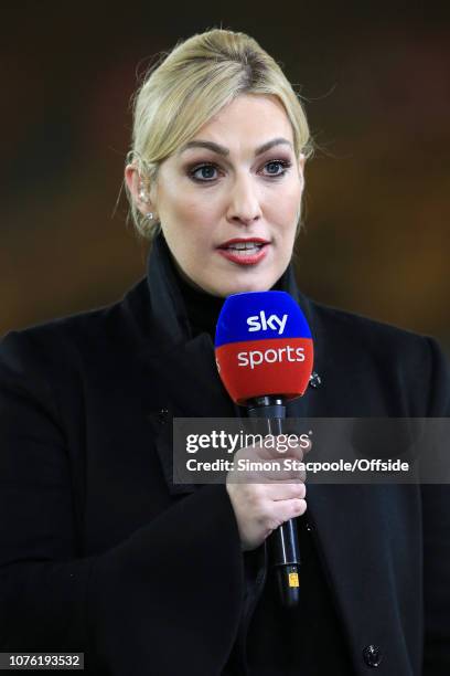 Sky Sports television presenter Kelly Cates holds the microphone ahead of the Premier League match between Wolverhampton Wanderers and Liverpool at...