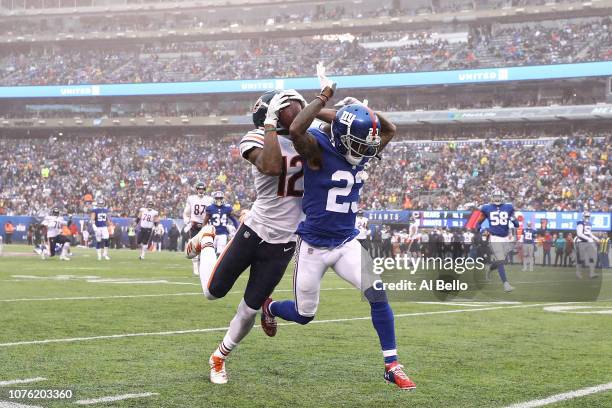 Allen Robinson of the Chicago Bears makes a catch during the second quarter while defended by B.W. Webb of the New York Giants at MetLife Stadium on...