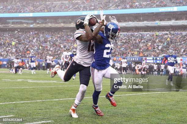 Allen Robinson of the Chicago Bears makes a catch during the second quarter while defended by B.W. Webb of the New York Giants at MetLife Stadium on...