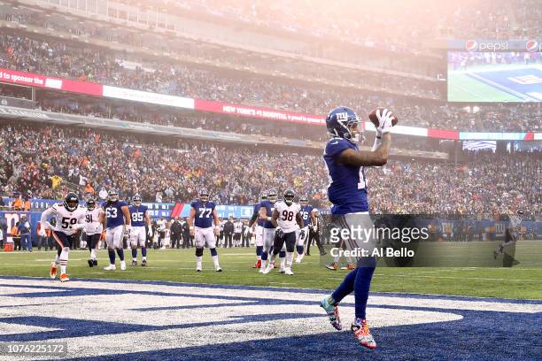 Odell Beckham of the New York Giants scores a third quarter touchdown reception against the Chicago Bears at MetLife Stadium on December 02, 2018 in...