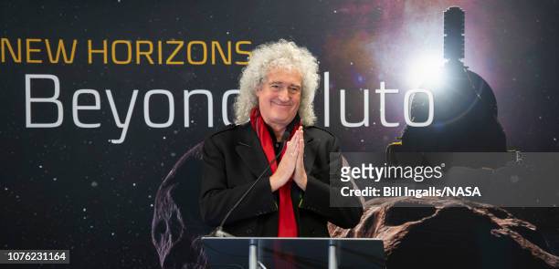 In this handout provided by NASA, Brian May, lead guitarist of the rock band Queen and astrophysicist discusses the upcoming New Horizon's flyby of...