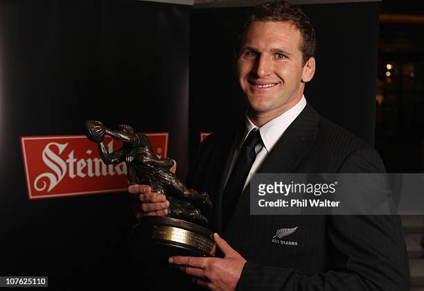 Kieran Read poses with the Kelvin R Tremain Memorial Player of the Year award during the Steinlager Rugby Awards at the Langham Hotel on December 16,...