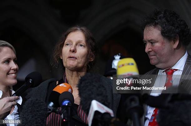 Mark Stephens watches as Christine Assange, the mother of WikiLeaks founder Julian Assange, talks to reporters at The High Court on December 16, 2010...