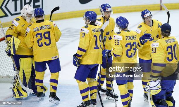 Sweden celebrates following a win versus Kazakhstan at the IIHF World Junior Championships at the Save-on-Foods Memorial Centre on December 31, 2018...