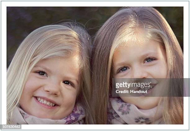 In this undated handout photo provided on December 16, 2010 by the Spanish Royal House, Princess Sofia and Princess Leonor pose for a photograph to...