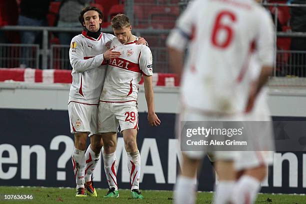 Christian Gentner of Stuttgart celebrates his team's third goal with team mate Pavel Pogrebnyak during the UEFA Europa League group H match between...