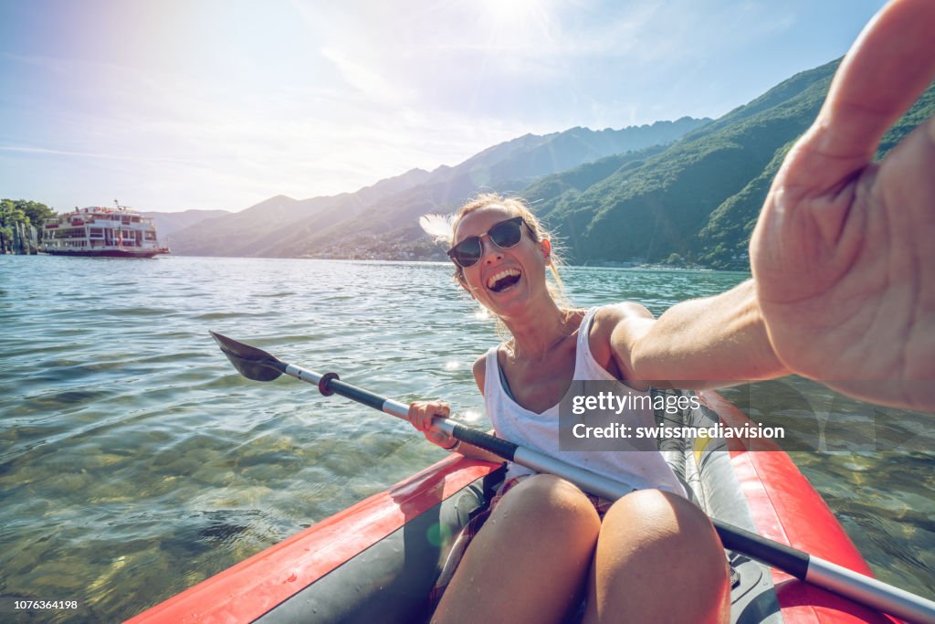 Selfie on canoe in Summer enjoying lake and nature