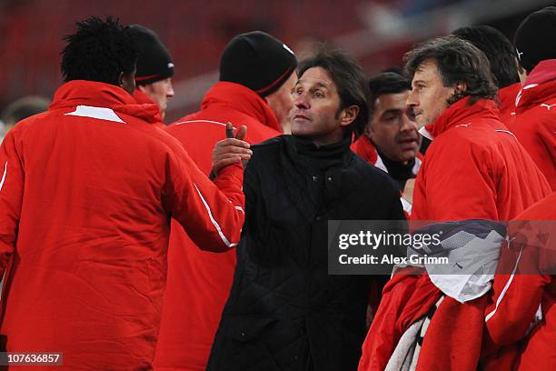 New head coach Bruno Labbadia of Stuttgart celebrates with team members after the UEFA Europa League group H match between VfB Stuttgart and Odense...