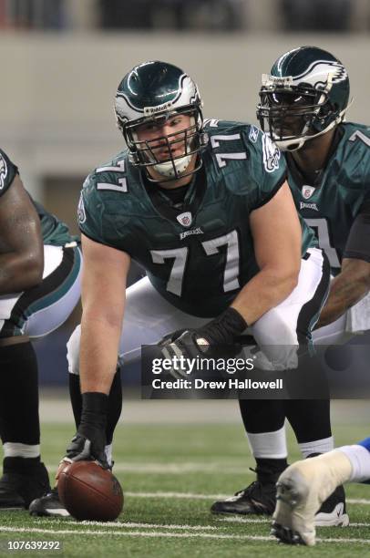 Guard Mike McGlynn of the Philadelphia Eagles lines up in front of quarterback Michael Vick during the game against the Dallas Cowboys at Cowboys...