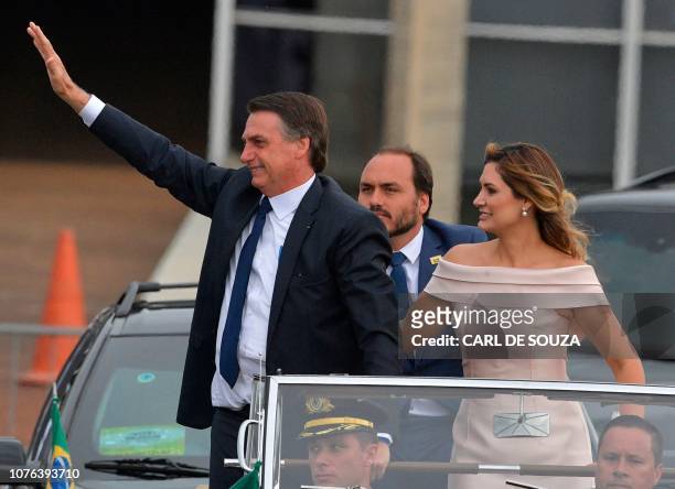 The presidential convoy, led by Brazil's President-elect Jair Bolsonaro and his wife Michelle Bolsonaro in a Rolls Royce, heads to the National...