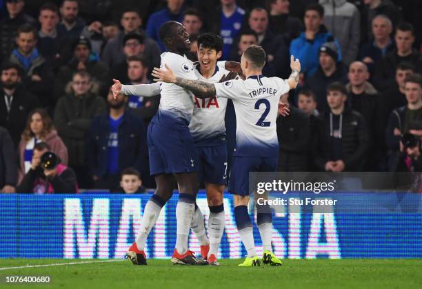 Heung-Min Son of Tottenham Hotspur celebrates after scoring his team's third goal with Kieran Trippier and Moussa Sissoko during the Premier League...